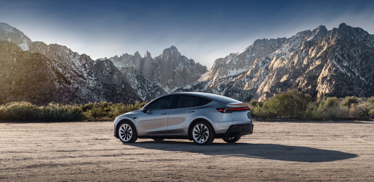 Tesla Model Y in a mountain landscape